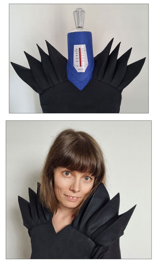 Spiked shoulders made with accordion pleats.