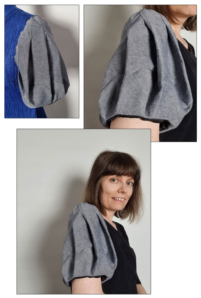 The finished sleeve in denim with diagonal pleats.
