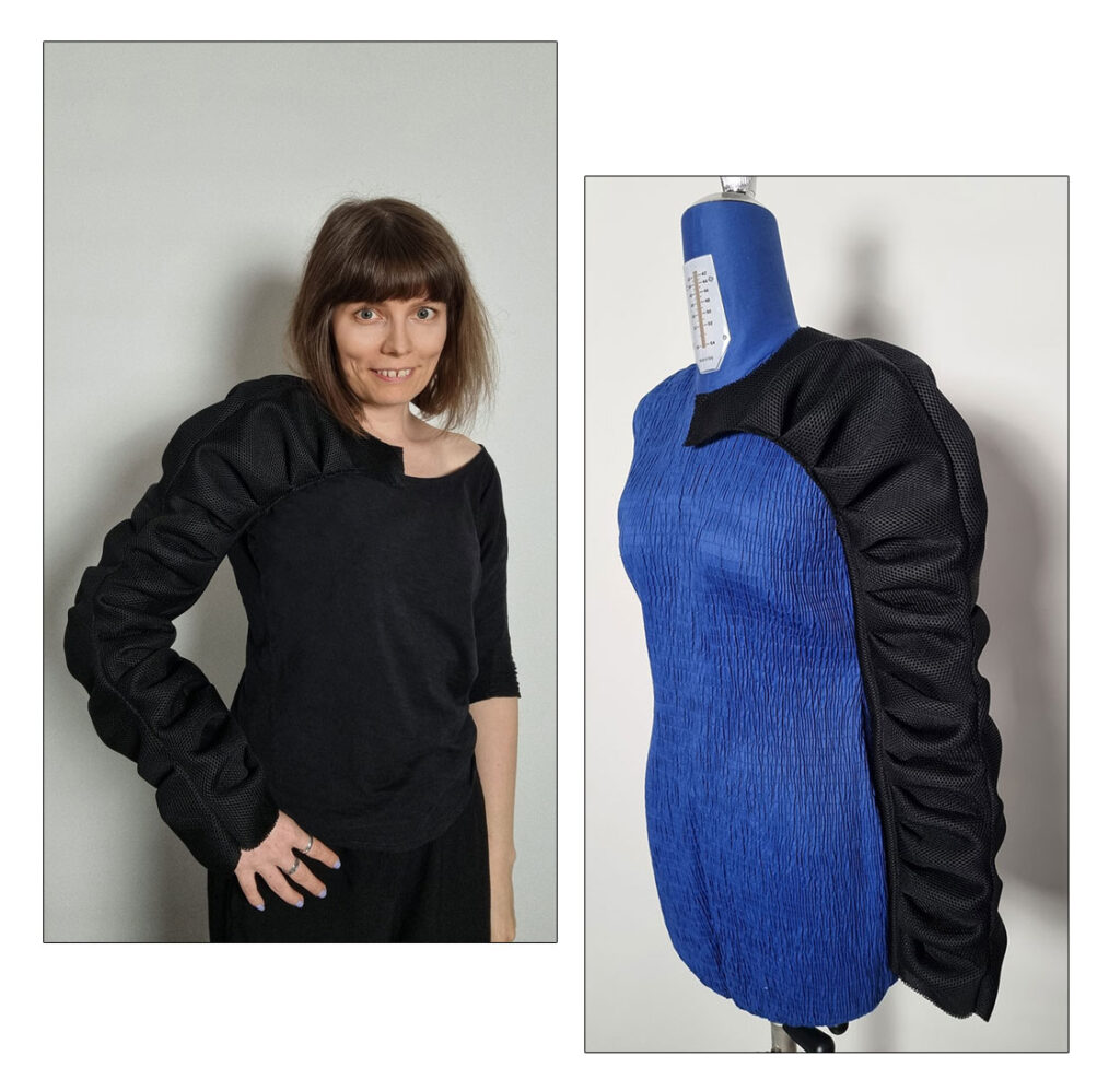 The finished raglan sleeve with bamboo petal folds, made in black neoprene.