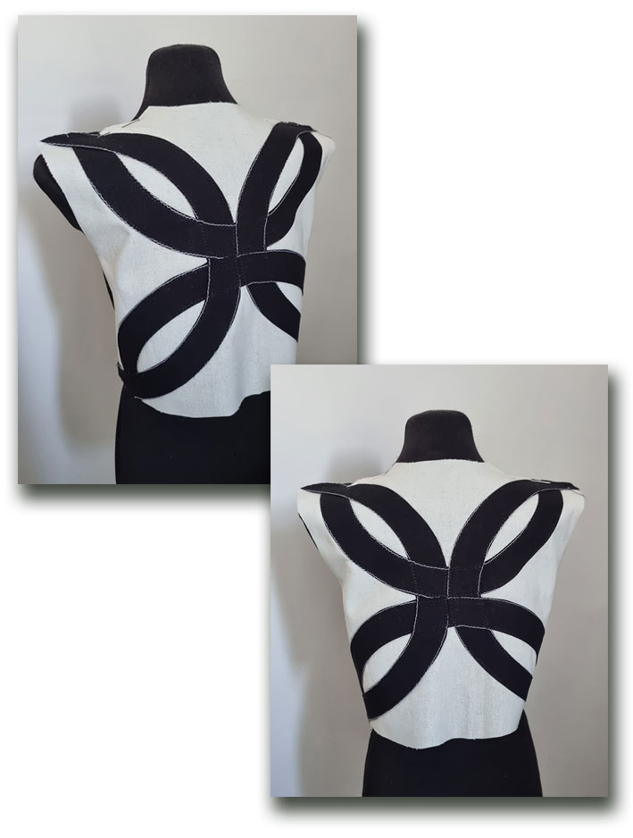 The dartless bodice back with a "celtic knot" motif on the mannequin.