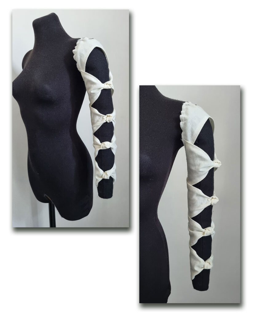 The knot sleeve on the mannequin.