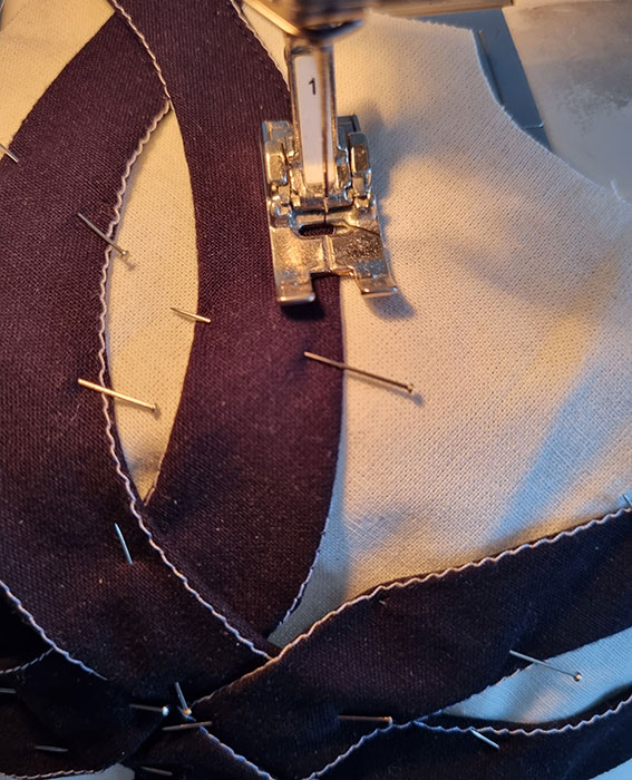 Sewing the strips near the edge.
