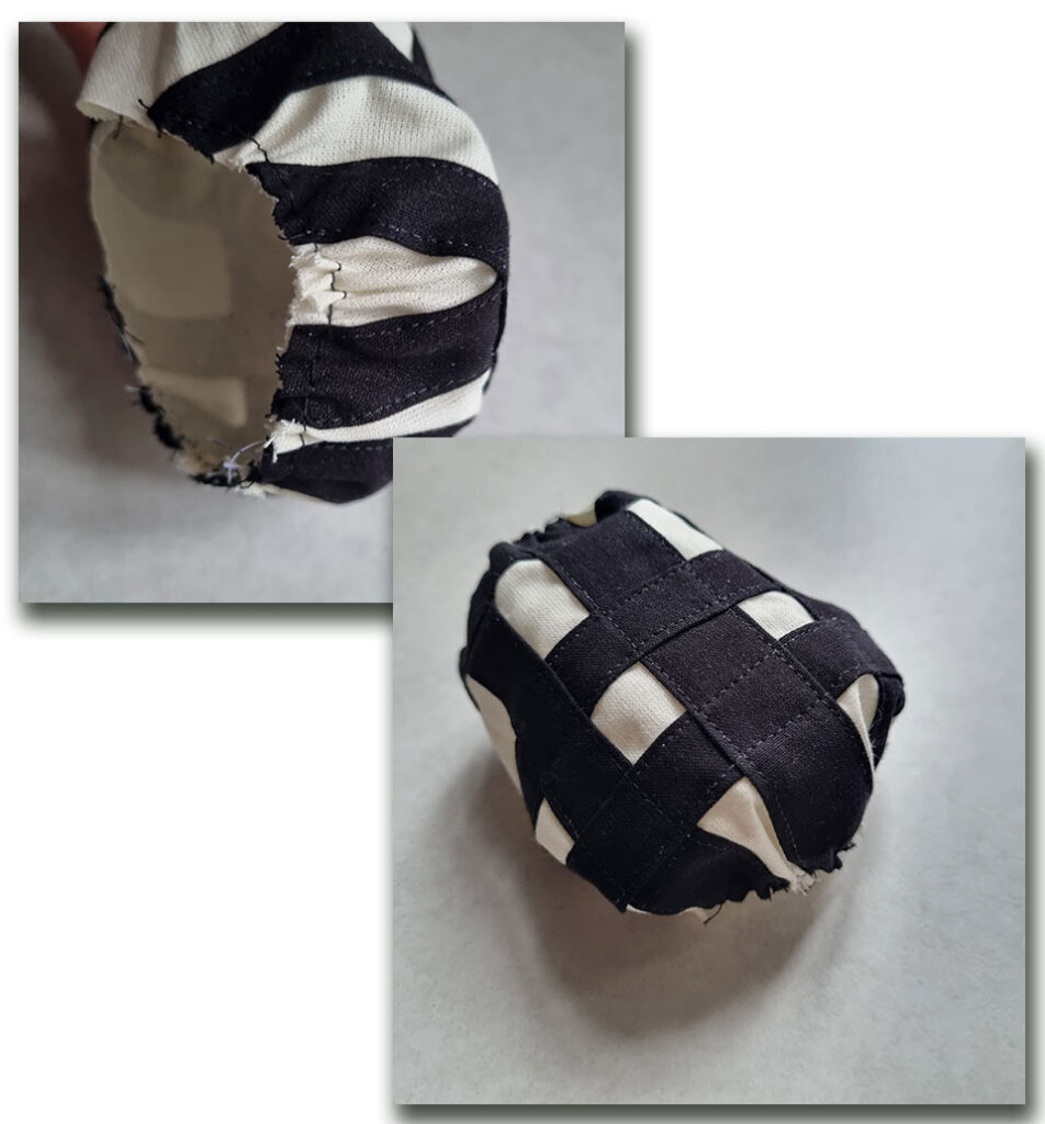 The sleeve with the hem and cap gathered.