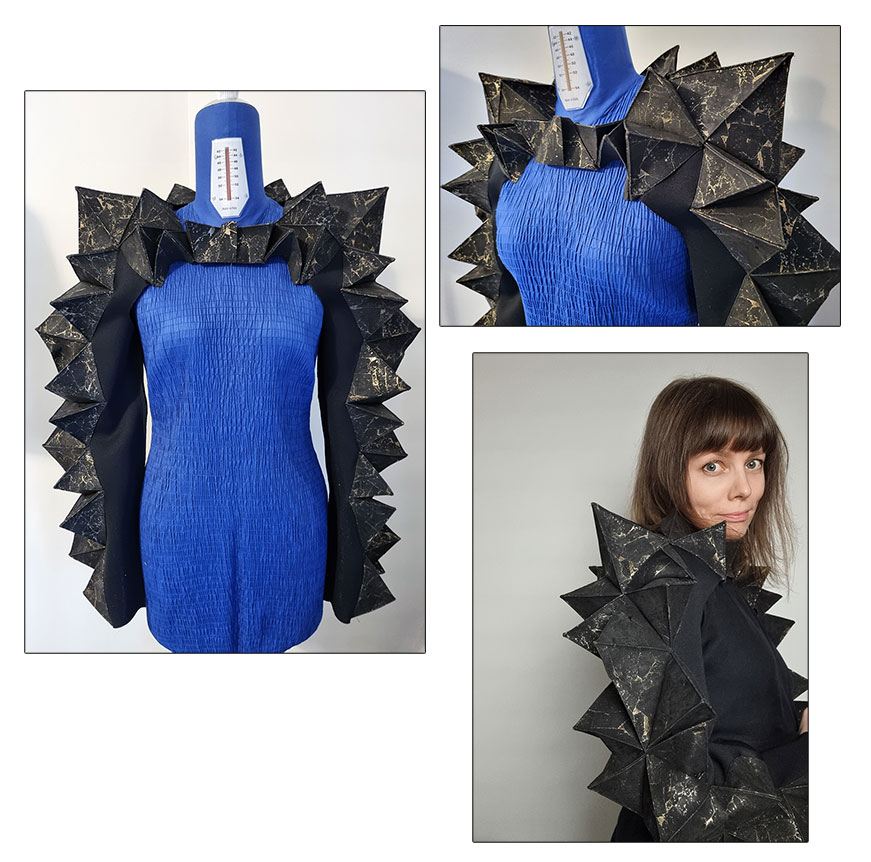 Polyhedron bolero made in black cork fabric with golden details on the mannequin and on me.