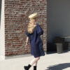 Model wearing the Callisto dress made in denim. Back view. Photo by Laura Oja.