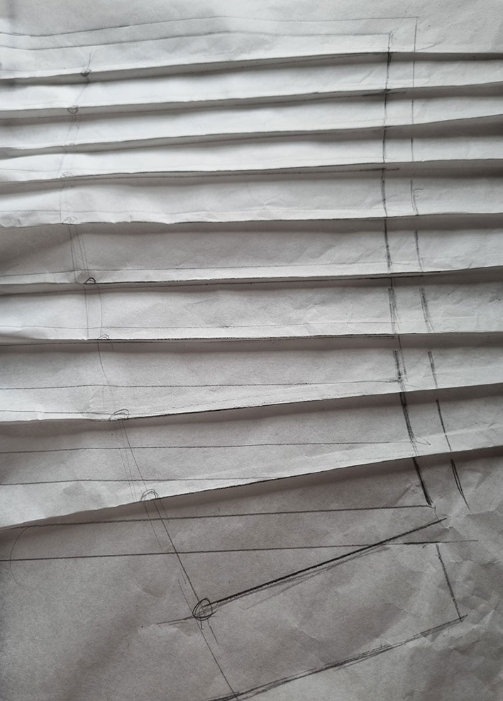 The pattern with the tucks folded.