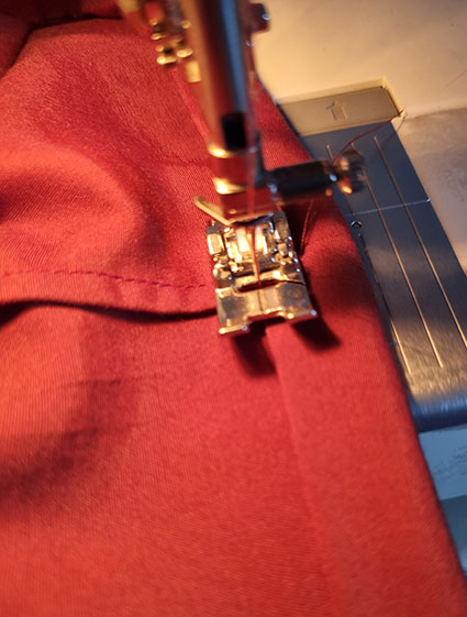 Hemming the pants.