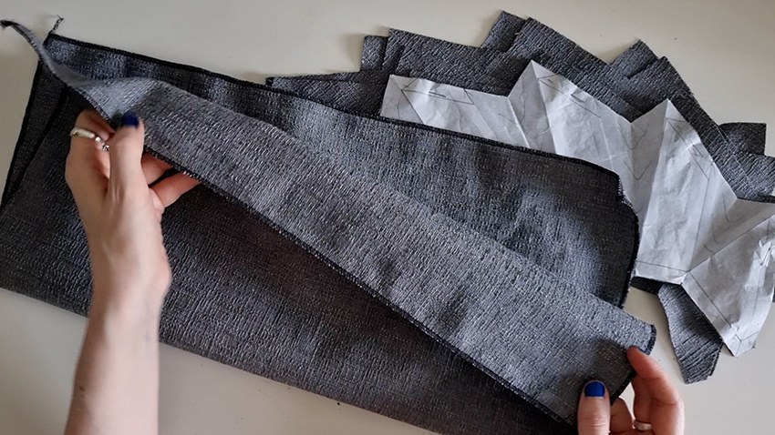 The front and back pieces have been cut and the back piece serged.