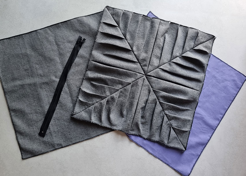 The completed front piece with the back piece, lining piece and the zipper.